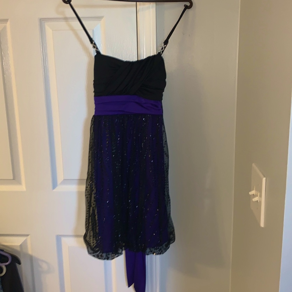 Gorgeous evening dress size small, 100% polyester purple and black .